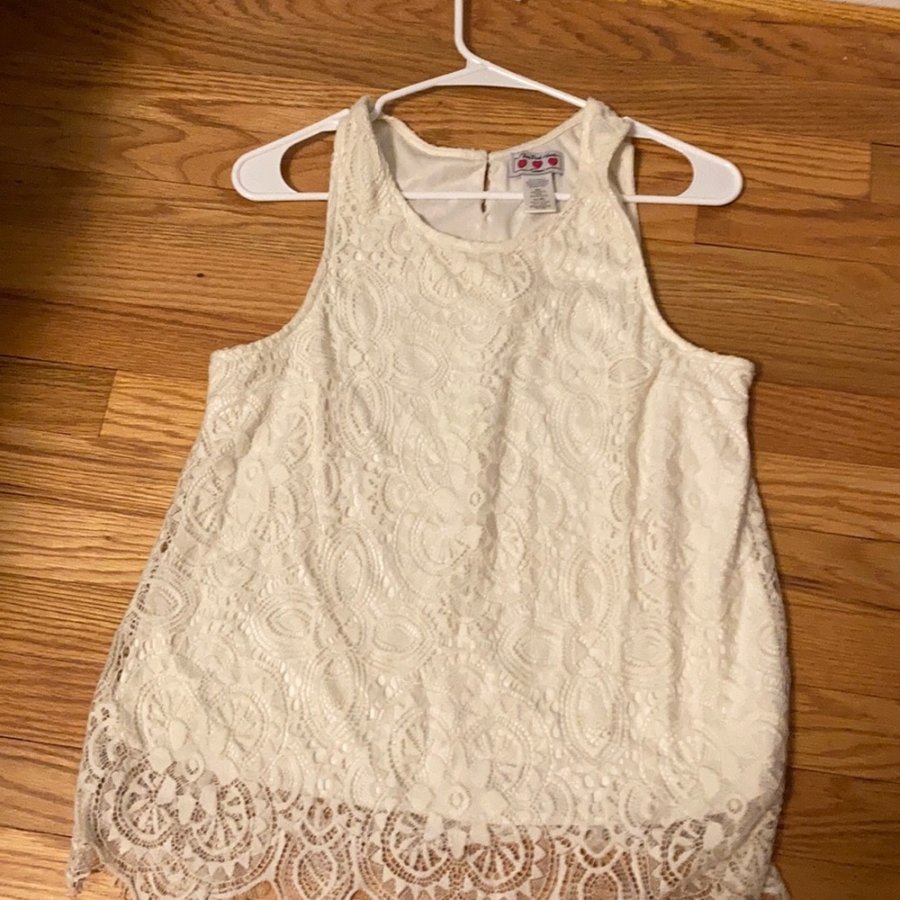 white laced no sleeve shirt. size XL kids